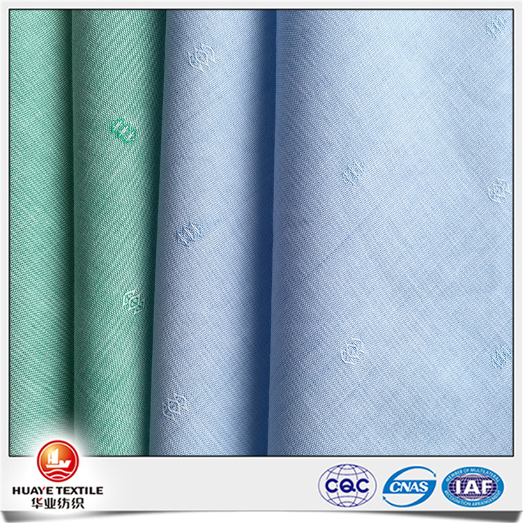 Yarn dyed tencel silk dobby wholesale fabric for fashion shirt